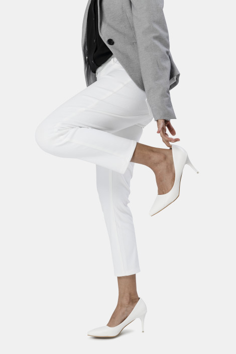 Businesswoman wearing her white high heel