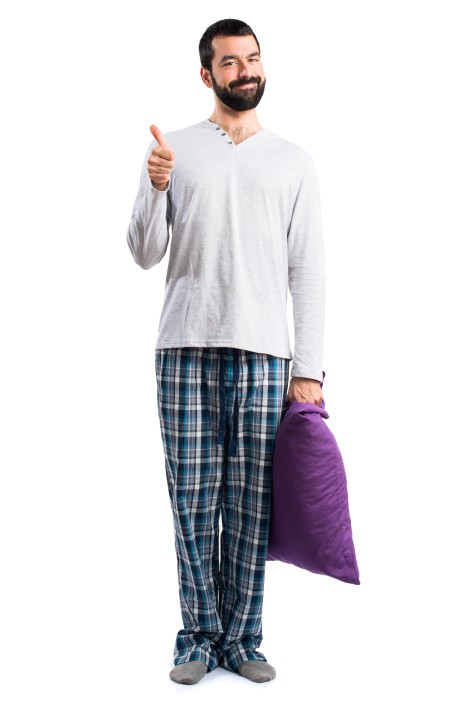 Man in pajamas with thumb up